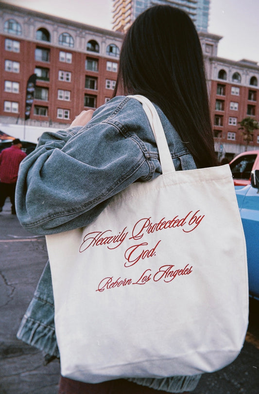 “Heavily Protected by God.” Tote